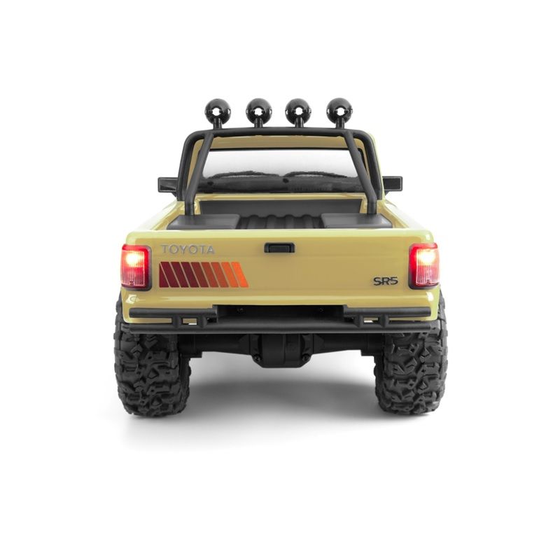 Venture18 1985 Toyota Hilux RS5 - Creme view 2